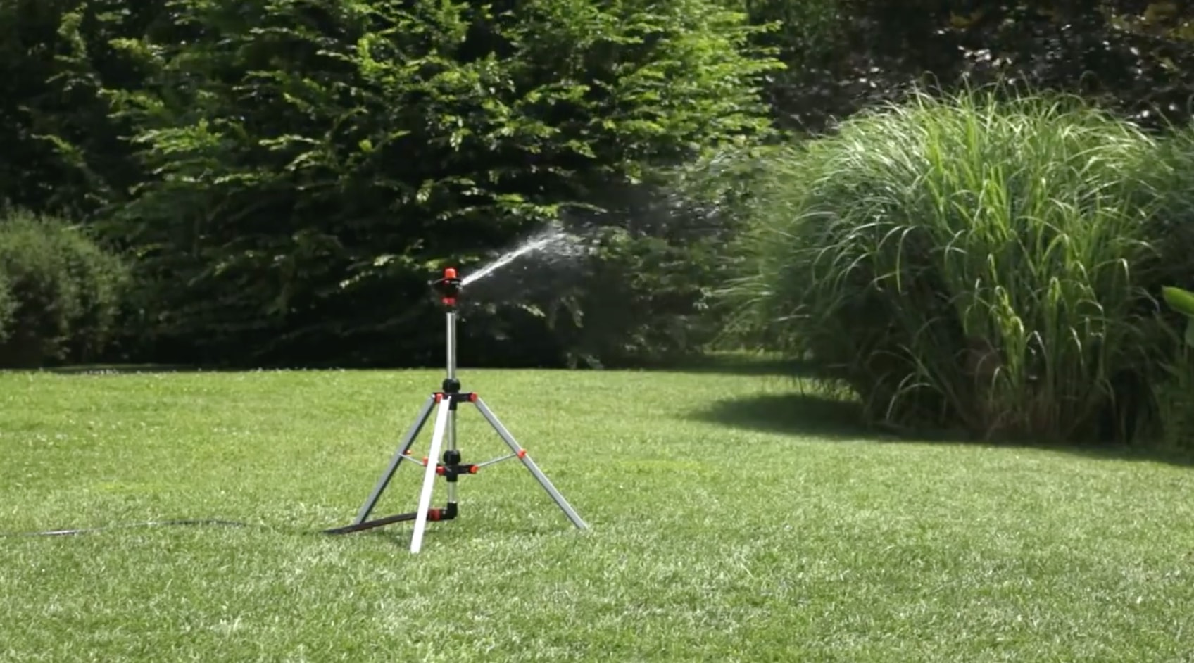 How To Setup And Use A Tripod Lawn Sprinkler cover